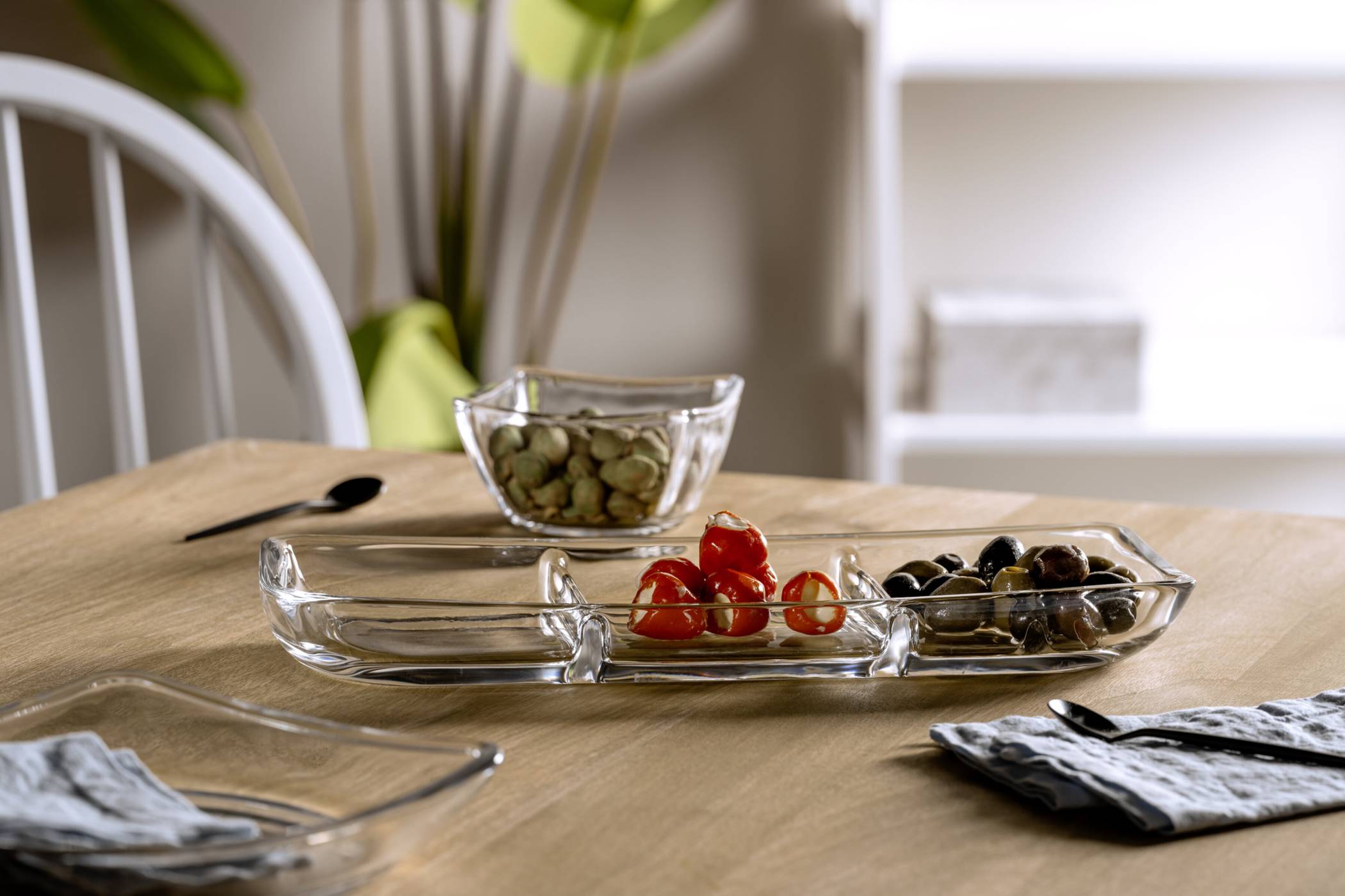Glasserie „Piazza“: Zum Aperitif werden kleine Snacks in Schälchen gereicht.