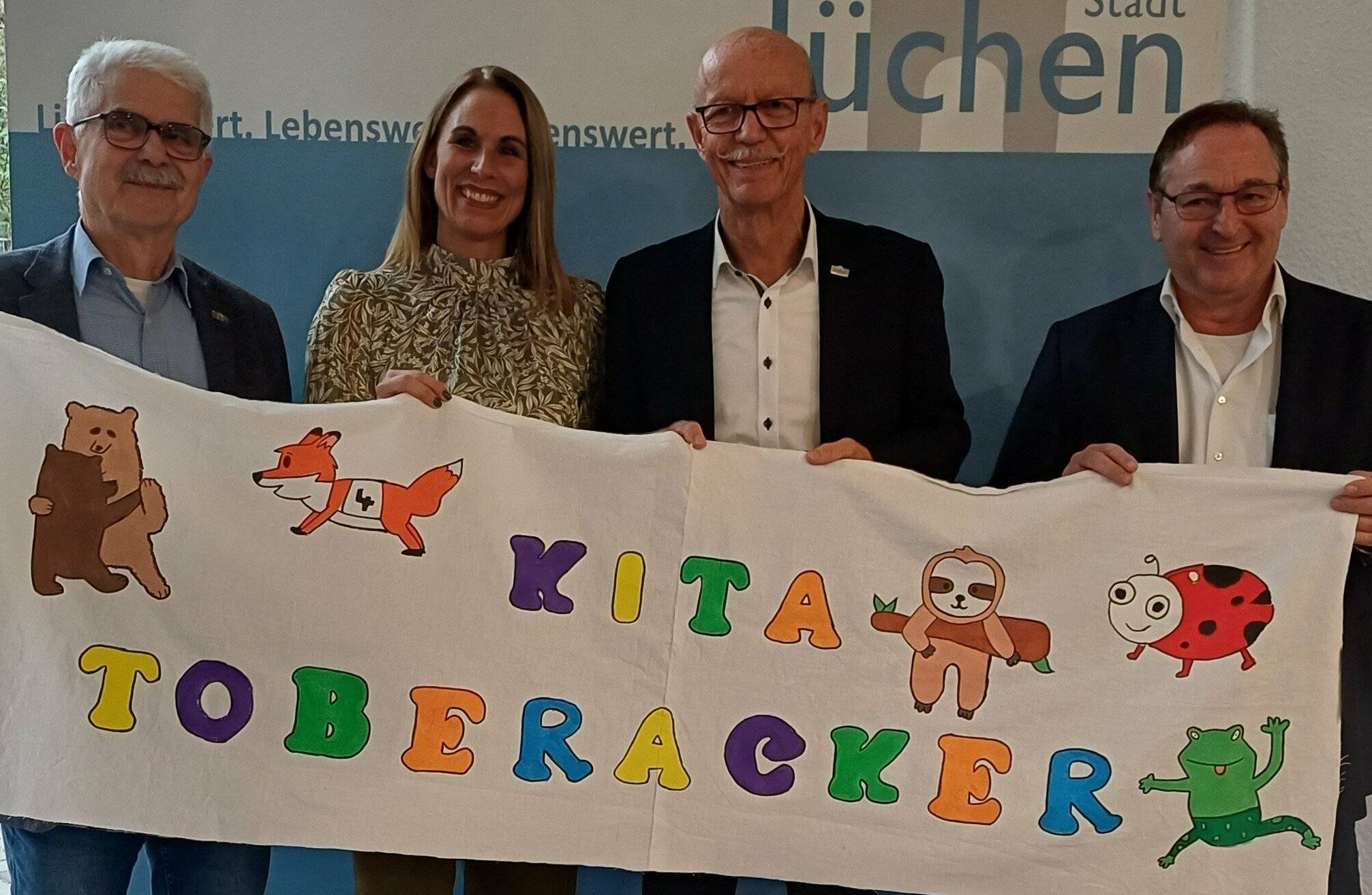 Von links: Dezernent Oswald Duda, Kita-Leiterin