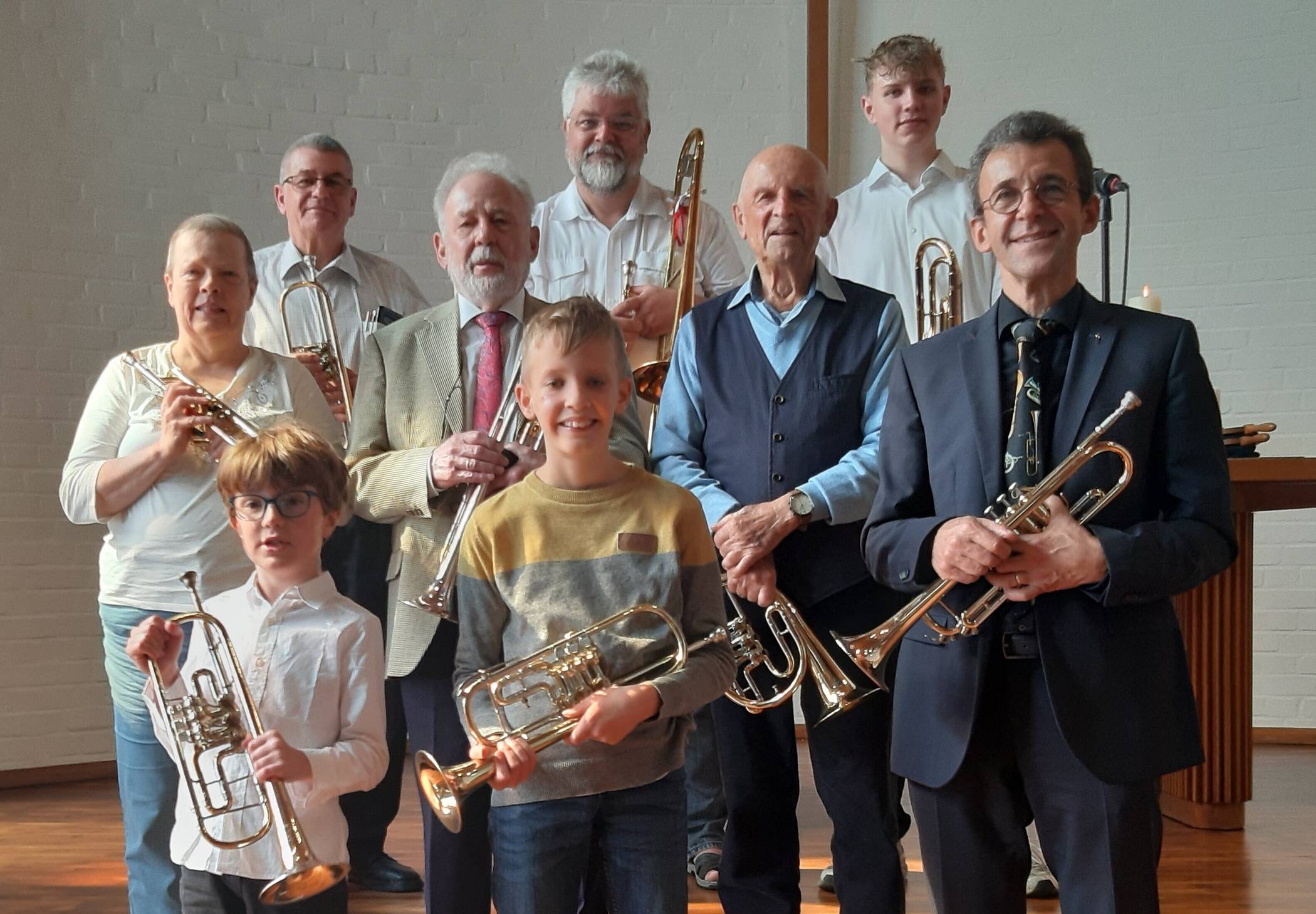 Engagierte Bläser zusammen mit ihrem Chef, Kantor Karl-Georg Brumm.
