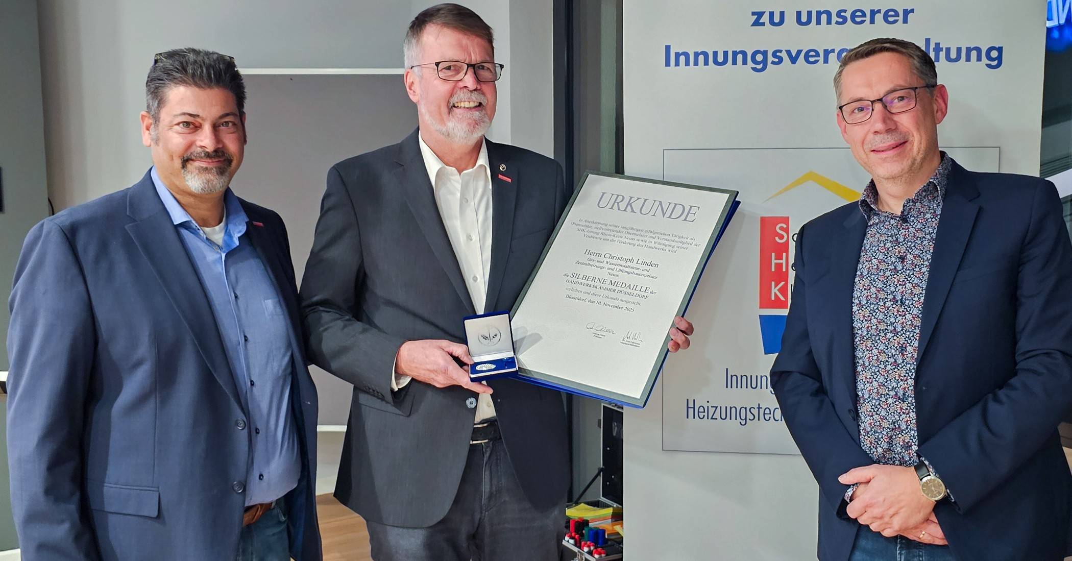 Der künftige Obermeister Thomas Hanna (links)