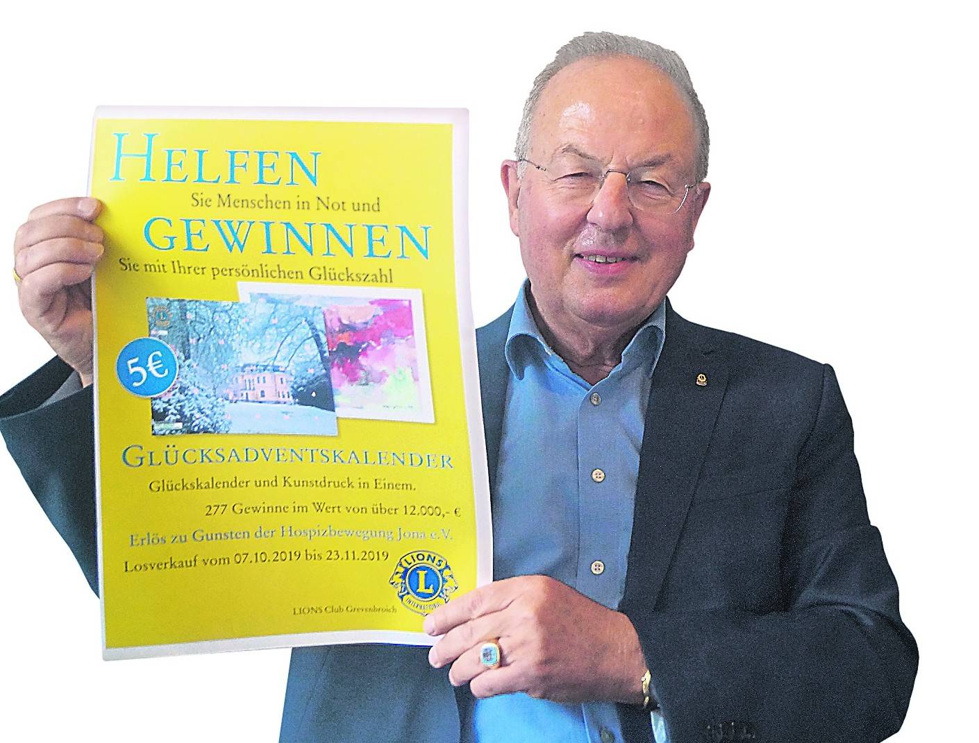   Norbert Neuwahl, Kalenderbeauftragter des Grevenbroicher „Lions-Club“, präsentiert den Adventskalender für 2019:   